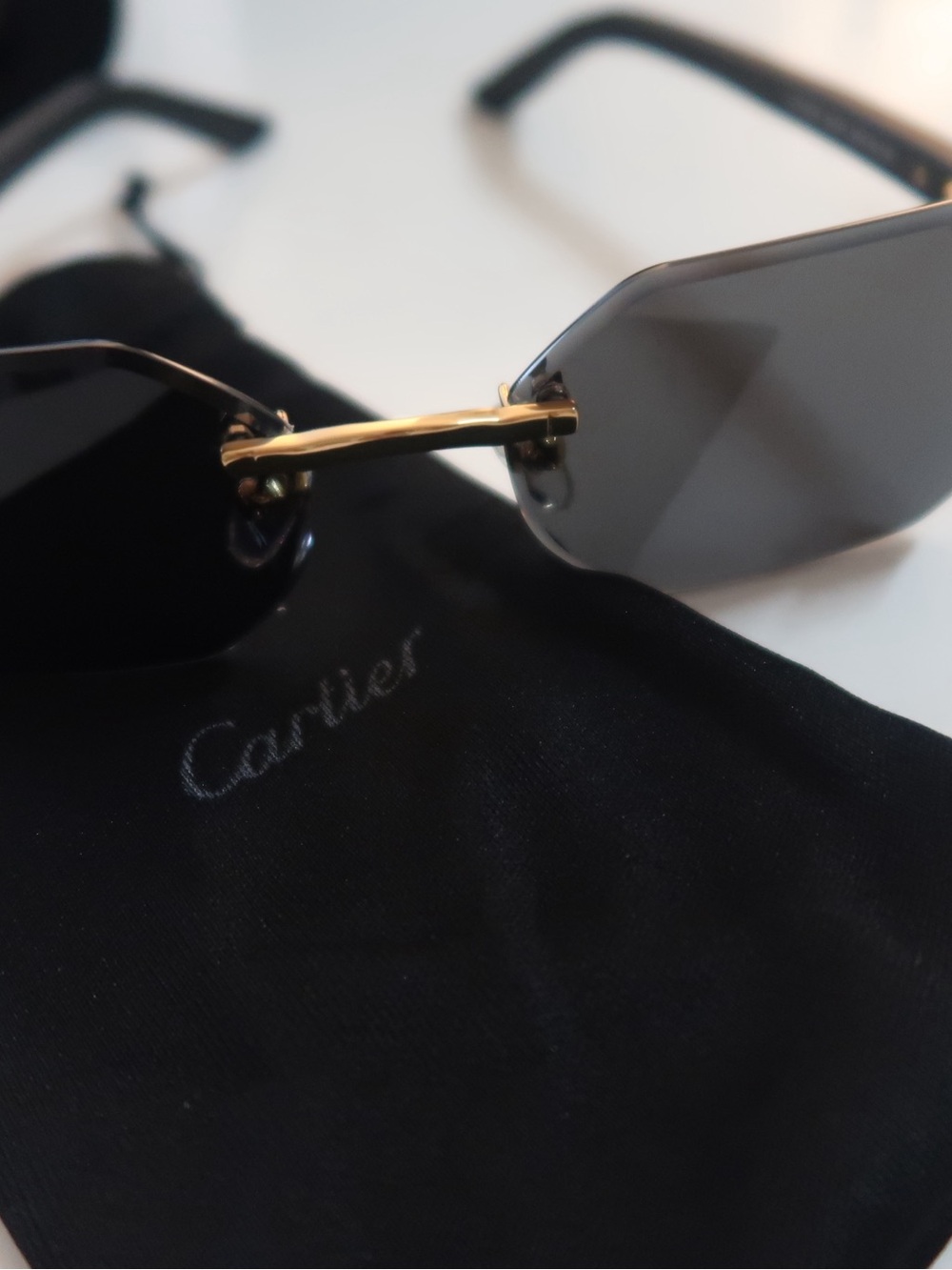 Geometric Rimless Sunglasses — Black & Gold Accents